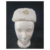 MCM white fur pillbox hat with brooch