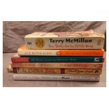 Novels including How Stella Got Her Groove Back,