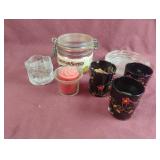 Candles, candle holders and an ash tray