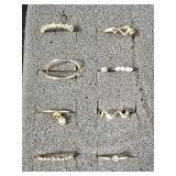 8 Goldtone fashion rings 8 Goldtone fashion rings
