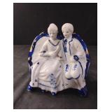 Vintage porcelain Victorian couple sitting