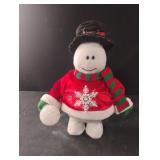 Snowman. 12.5" tall. Has a broke arm