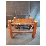vintage wooden footstool with woven seat. vintage wooden footstool with woven seat.