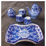 Vintage blue floral porcelain miniature tea set.