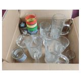 Drinking glasses, a shot glass and 2 small jars