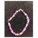 Handmade pink and clear beaded bracelet