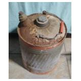 Metal gas can. Has liquid