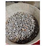 Galvanized bucket with nails