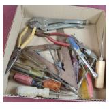 Screwdrivers, wire cutter, hole punch and