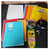 Binder. Pencils pens, folders, paper, thumb