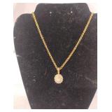 Nolan Miller gold tone chain 14" and CZ charm