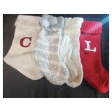 Knitted stockings some have intitals