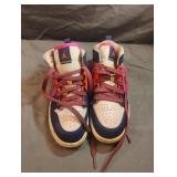 Nike Air Jordan 1 Mid in the "Fire Pink/Barely