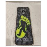 Bigfoot-themed wooden bottle opener with a metal