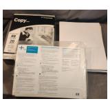 Copy paper-unopened and photo paper-opened.