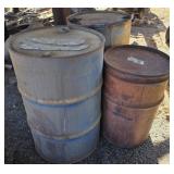 3 metal barrels empty