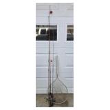 3 fishing rods and net
