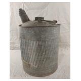 Vintage galvanized metal fuel can with funnel