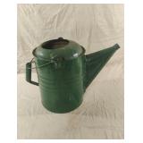 Vintage painted green metal watering can