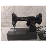 Vintage Singer Spartan sewing machine. Powers on