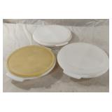 3-3 divided bowls with lids. 1 is Tupperware