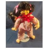 Plastic Asian doll with baby 13"