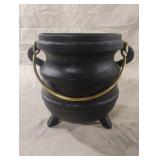 Cast iron three-legged cauldron