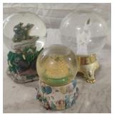 Frog, unicorn and birthday cake snow globes