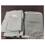 Queen sheet set with pillow cases and a bed skirt