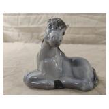Vintage Fenton horse figurine. Has a broken ear