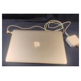 Mac Air Book. Powers on. Screen needs replaced.