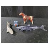Toy sharks, seal and horse