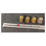 Vintage thimbols and sewing guide