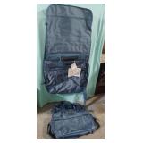 Verdi luggage. With tags. Blue in color