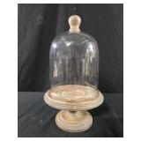 vintage-style glass cloche features a distressed