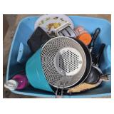 Tote full of kitchen stuff, stove covers, kitchen