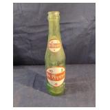 Vintage green glass Dr Pepper soda bottle with
