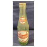 Vintage green glass Dr Pepper soda bottle with