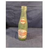 Vintage green glass Dr Pepper soda bottle with