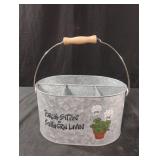 Galvanized metal divided basket with handle.