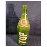 Vintage 7 Up green glass soda bottle with lid