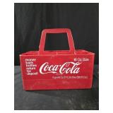 vintage red plastic Coca-Cola bottle carrier