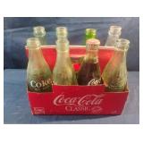 Vintage Coca-Cola cardboard carrier with glass