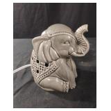 Elephant ceramic wax warmer. Bottom has small