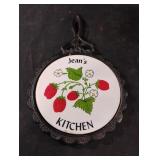 Vintage cast iron trivet. Jean