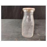 Vintage half pint round glass milk bottle