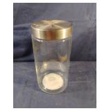 Glass canister with metal lid