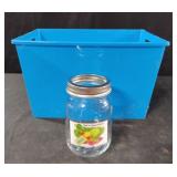 Glass pint jar and plastic storage bin