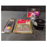 G-Shock metal tin, Chevrolet clear guards, pens