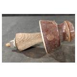 Vintage porcelain insulator with wood pin